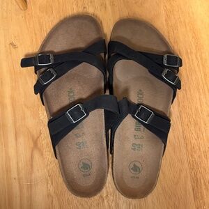 Black Birkenstock Sandals.